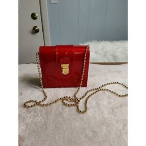 Stuart Weitzman Italian patent leather ruby red mini crossbody with gold beaded